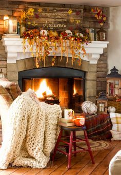 a living room filled with furniture and a fire place