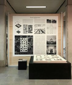 a display in a building with pictures on the wall