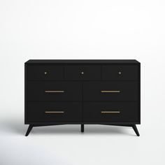 a black dresser with two gold handles and three drawers on one side, against a white background