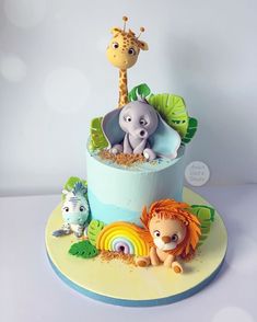 there is a cake that has animals on it