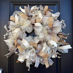 a wreath is hanging on the front door