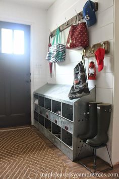 the entryway is clean and ready to be used as a storage area for shoes