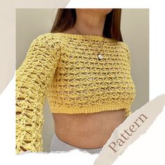 a woman wearing a yellow knitted crop top