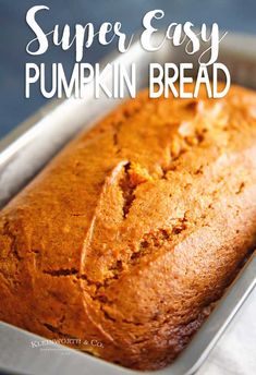 a loaf of pumpkin bread in a pan with the title super easy pumpkin bread on top