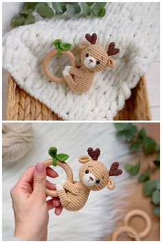 crocheted stuffed animals are being held by someone's hand and placed on a blanket