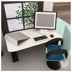 a desktop computer sitting on top of a white desk