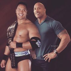 two men standing next to each other wearing wrestling gear and holding their arms around one another