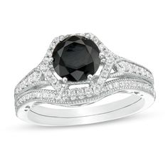 Make a stunning statement of love with this vintage-style bridal set. Crafted in cool in 10K white gold, this heartfelt choice showcases a 7.0mm lab-created rich black sapphire in an open hexagonal frame of shimmering diamonds. Additional diamonds gleam from the milgrain-detailed shank. Completing her ensemble, the coordinating wedding band shimmers with a row of diamonds and intricate milgrain borders. Radiant with 3/8 ct. t.w. of diamonds and a brilliant buffed luster, this ring reflects your Center Stone Engagement Ring, Timeless Symbol, Peoples Jewellers, Bridal Engagement Rings, Diamond Bridal Sets, Black Sapphire, Stone Engagement Rings, Sapphire Stone, Bridal Set