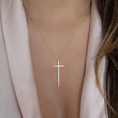 "Beautiful cross necklace is great for layering or worn on its own!  - - D E T A I L S - -  ▫︎ Made of 925 Sterling Silver ▫︎ THICK plating of 14k Gold, Rose Gold or Rhodium for a piece that will be with you for years to come!  ▫︎ 18\" + 3\" Extension Chain ▫︎ Pendant Measures at 42mm ▫︎ Lobster Clasp Closure ▫︎ Highest grade CZ stones for an authentic diamond look Necklace on model: Dainty Charm: https://www.etsy.com/listing/1239039608/dainty-necklace-minimalist-necklace?click_key=d207af37bc9454530c832ec715979a8f86238c46%3A1239039608&click_sum=25736a2f&ga_search_query=bezel&ref=shop_items_search_23&pro=1&sts=1 Herringbone Chain: https://www.etsy.com/listing/889269128/layering-necklaces-layered-necklace?click_key=7edb6952694d5e706f4c9e2cd698c2a031d455da%3A889269128&click_sum=5be82f9f&ga_se Dainty Cross Necklace, Necklace Cross, Gold Cross Necklace, Gold Cross Pendant, Shop Engagement Rings, Gold Cross, Cross Pendant Necklace, Chain Pendant, Minimalist Necklace