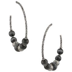 Simple and versatile the Midnight Lights Hoop Earrings are a stunning accessory for any outfit. A silver tone twisted design creates the hoop earrings and attaches to post back wires. Bright silver tone beads that have a smooth mirrored finish reflect the colors around them for an intriguing design. In between are muted darker beads that create an interesting piece and complete the earrings. All Montana Silversmiths jewelry and accessories are coated with Montana Armor to prevent tarnish. The hoop earrings are secured by post back wires. The silver tone and dark grey beads create a bold look. Montana Silversmith Jewelry, Grey Beads, Tractor Supply, The Midnight, Jewelry And Accessories, Accessories Jewelry Earrings, Women Accessories Jewelry, Tractor, Montana