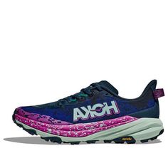 a woman's hoka running shoe in blue and pink with white lettering on the side