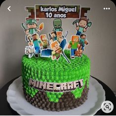 a birthday cake decorated with minecraft characters