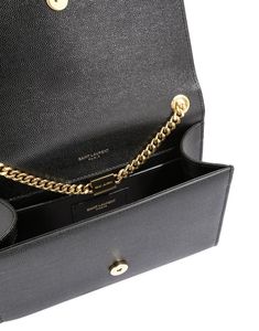 Saint Laurent gourmette chain shoulder bag with interlocking metal YSL signature and tassel. Grained leather Measurements: 7.8”x4.9”x2.0” Country of Origin: Made in Italy Ysl Kate, Leather Shoulder Handbags, Saint Laurent Bag, Beach Tote Bags, Shoulder Handbag, Chain Shoulder Bag, Small Bag, Handbag Backpack, Shoulder Handbags