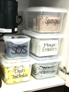 some containers are stacked on top of each other in the refrigerator, with labels reading sos, magic erasers, dish dishes and sponges