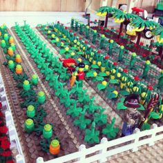 there are many lego plants in the yard