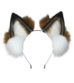 the cat ears are decorated with white and brown fur