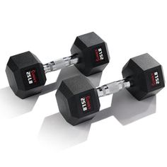 two black dumbbells sitting next to each other on a white surface with red lettering