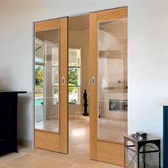 an empty living room with sliding glass doors