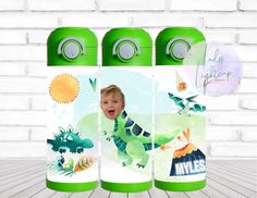 three green and white children's personalized water bottles with pictures of dinosaurs on them