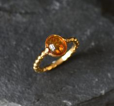 Gold Amber Ring set with a Natural Amber in the highest quality & brownish-yellow translucent resin, at 10x8mm, 3 Carats, sourced from Russia. Solitaire Ring made of Gold Vermeil ☞ thickest 18k Gold Plating on top of Solid 925 Sterling Silver ☞ made to last. Matching Pendant: www.etsy.com/listing/880333511 Matching Earrings - please ask me ☞ Choose your size ☞ I resize (before shipping) for FREE to Any size* ⌛Last Ring left ⌛ ❀ Each Natural Gem is unique & will have Slight variations from the pr Amber Engagement Ring, Yellow Gemstone Ring, 3 Carat Ring, Brownish Yellow, Amber Gemstone, Yellow Gemstones, Jewelry Accessories Ideas, Amber Earrings, Amber Ring