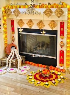 a fireplace decorated with flowers and candles