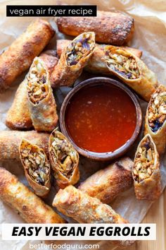 vegan eggrolls with dipping sauce on top and the words easy vegan egg rolls