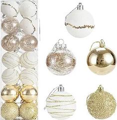 christmas ornaments are arranged in different shapes and sizes, including white and gold ones with golden accents