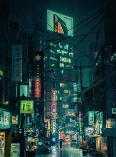 a city street at night with lots of neon signs on the buildings and people walking in the rain