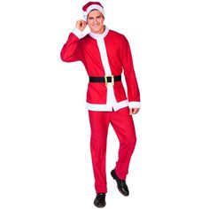 a man dressed as santa clause posing for the camera with his hand on his head