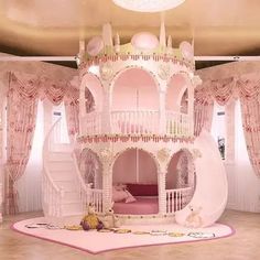 a doll house in the middle of a room with pink carpet and curtains on the walls