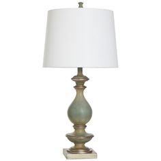 a table lamp with a white shade on it