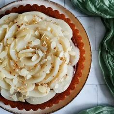 there is a pie with bananas on it