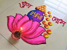 a pink flower with the words happy diwali written on it