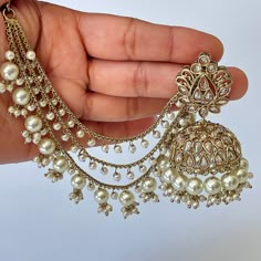 Restocked Bahubali Polki Pearl Jhumka/stone Jhumka/Indian Jewelry/Pakistani/Punjabi/Indian/Statement earring/Bridal earring/Indian wedding Can be paired with any dress Closure: Pushback This is 100% Handmade jewelry. So Color, shades, texture displayed may slightly vary from the actual product due to digital image limitations. We request you to consider these minor variations. Please expect the possibility of some slight imperfections when buying hand made jewelry. If you have any questions, please message or email us. Arrives in gift box. Please let me know if you have any questions. Thank you so much visiting my shop. Luxury Kundan Earrings For Party, Types Of Indian Earrings, Prom With Indian Jewelry, Heavy Indian Earrings, Luxury Bollywood Style Meenakari Earrings, Luxury Traditional White Chandbalis, Indian Jewelry Earrings Jhumka, Luxury Chandbali Bridal Earrings For Anniversary, Luxury Chandbali Jhumkas