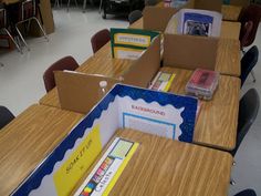 an empty classroom filled with desks and books