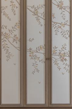 an armoire with flowers painted on it