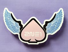 a pink and blue sticker with wings on it that says, eisu