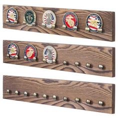 four wooden coat racks with metal knobs and magnets on each one, all decorated in the colors of the american flag