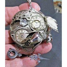 Brand new without tags.  By Hunger Creations  Original "one of a kind" handcrafted brooch/pin or pendant. Steampunk with bling crossover style.  All silver tone.  This piece can be worn as a necklace or pin.  Silver rose, time pieces and clear accent stone make a stunning and unique brooch or pendant.  Ships quickly! Handmade Metal Brooches For Gifts, Handmade Metal Brooches As Gifts, Unique Metal Jewelry Brooch, Unique Metal Brooch Gift, Unique Silver Metal Brooches, Unique Silver Metal Brooch, Handmade Silver Pendant Brooches, Handmade Silver Pendant Brooch, Unique Metal Brooch