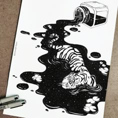 a black and white drawing of a tiger laying in water next to a trash can