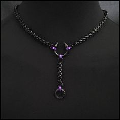 My locking day collar features a black spike top torc connector with passionate purple connector halos (connector rings) on a durable black finish stainless steel wheat braid design chain. A drop chain is included as shown in the images. There is a hex lock centered behind the neck. The torc's spikes are not removable. The drop chain spring ring connector can be opened to attach things. Choose from 13 made-to-order necklace sizes in 1-inch increment sizes. Choose from 9 drop chain lengths in 1/2 Pride Necklace, Day Collar, Magical Jewelry, Professional Jewelry, Fantasy Jewelry, Gothic Jewelry, Jewelry Inspo, Black Stainless Steel, Pretty Jewellery