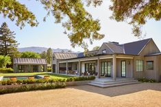 a house with a pool in the front yard