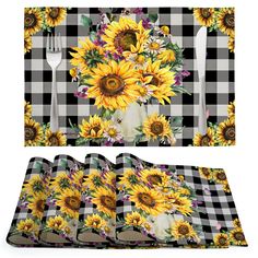 sunflowers and flowers on black and white checkered tablecloth with utensils