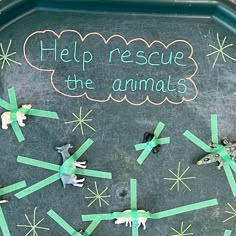 a chalkboard with writing on it that says help rescue the animals