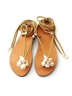 Hey, I found this really awesome Etsy listing at https://www.etsy.com/listing/727640471/sea-shells-pearls-rope-sandals-wedding Elegant Handmade Beach Sandals, Gold Sandals For Summer Beach Wedding, Cream Single Toe Strap Sandals For Beach, Handmade Ankle Strap Sandals For Beach Wedding, Beach Season Wedding Ankle Strap Sandals, Ankle Strap Sandals For Beach Season Weddings, Beach Wedding Open Toe Sandals, Shell Sandals, Bridal Party Shoes