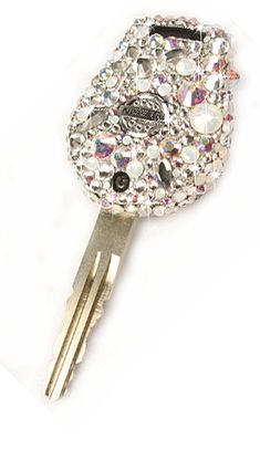 a crystal keychain with two keys attached to it