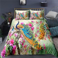 the bed is decorated with colorful peacocks and flowers