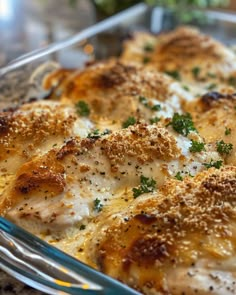 a casserole dish with cheese and herbs