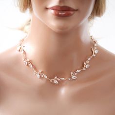 Beautiful floral design with just the right amount of sparkle. Our Rose gold Bridal backdrop necklace Aprille is crafted with cubic zirconia stones that shimmer like real diamonds. - Created with Premium Cubic Zirconia stones- Rose gold finish- Available in rose gold, yellow gold, and rhodium finish.- Necklace pictured measures 15.5 inches x .5 inches extends to 17.5 inches- Backdrop pictured measures 9.5 inches x .5 inches- Nickel free and hypoallergenic- PLEASE ALLOW APPROX 7-10 BUSINESS DAYS Wedding Gown Necklace, Bridal Backdrop, Gold Stone Necklace, Bridal Backdrops, Bridal Backdrop Necklace, Backdrop Necklace, Rose Gold Wedding Jewelry, Backdrops Necklace, Crystal Bridal Earrings