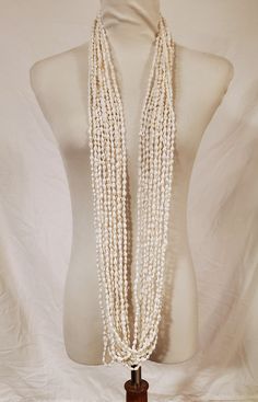 "12 Strands about 56\" White or Beige Nassa Shell Necklace Lei Hawaiian Set Graduation Wedding Birthday Luau Loop Lei is made with  Nasa Shells, each shell is approximately 2-4mm, around 56\"  in length, strung with strong string. It comes in a set of 12 strand, you can wear it together or separated. Loop it around to wear it short, or long, style it to your liking.  Shipping from Pearl City, Hawaii 96782" Pearl City Hawaii, Candy Lei, Birthday Luau, Hawaiian Lei, Greek Isles, Surfer Necklace, Private Island, Wedding Jewellery Necklace, Cowrie Shell